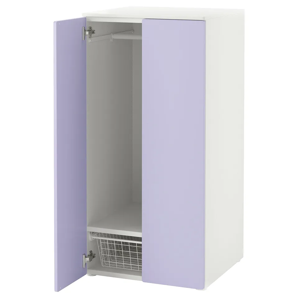 A white and lavender SMÅSTAD wardrobe. Its designed for children, featuring adjustable shelves, a hanging rod, and soft-closing doors.