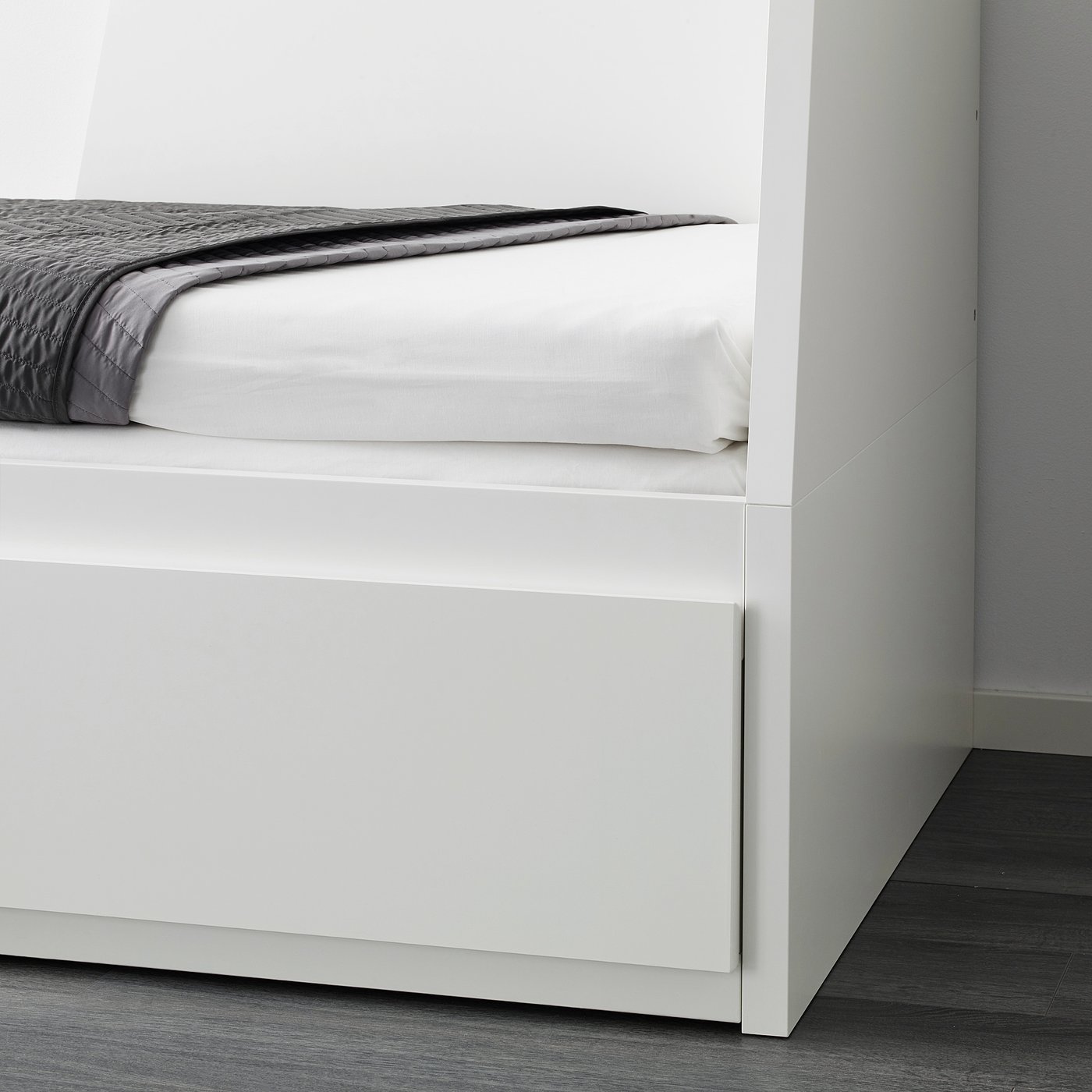 Backrest of a multi-functional day-bed/sofa with two large drawers for storage.