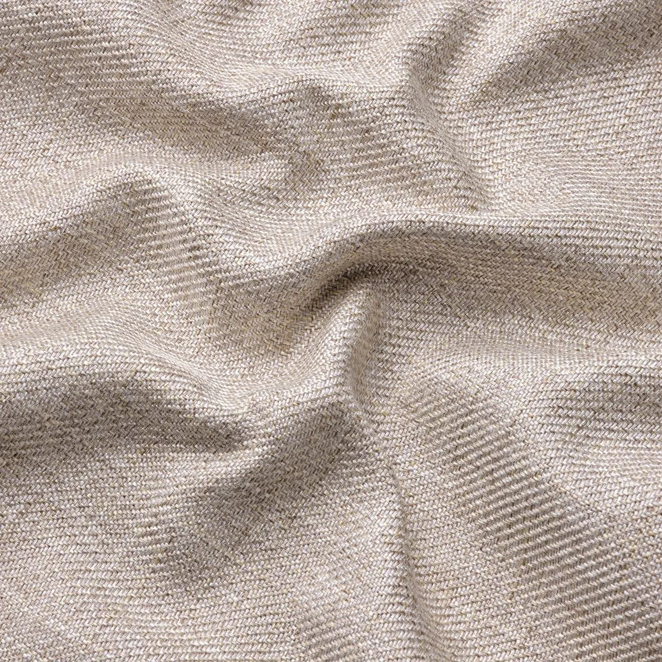 Soft, textured fabric close-up, showcasing intricate weave and subtle melange effect.