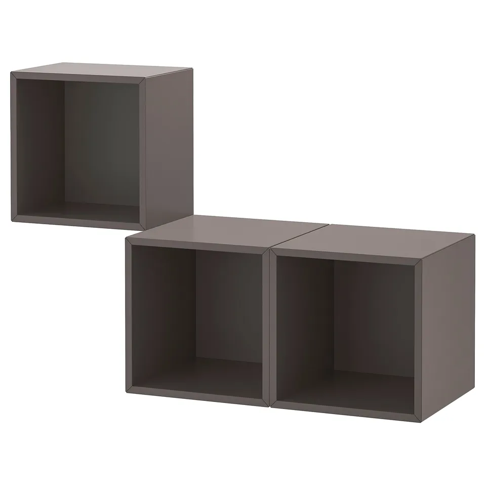 Grey modular wall-mounted shelves with open design.