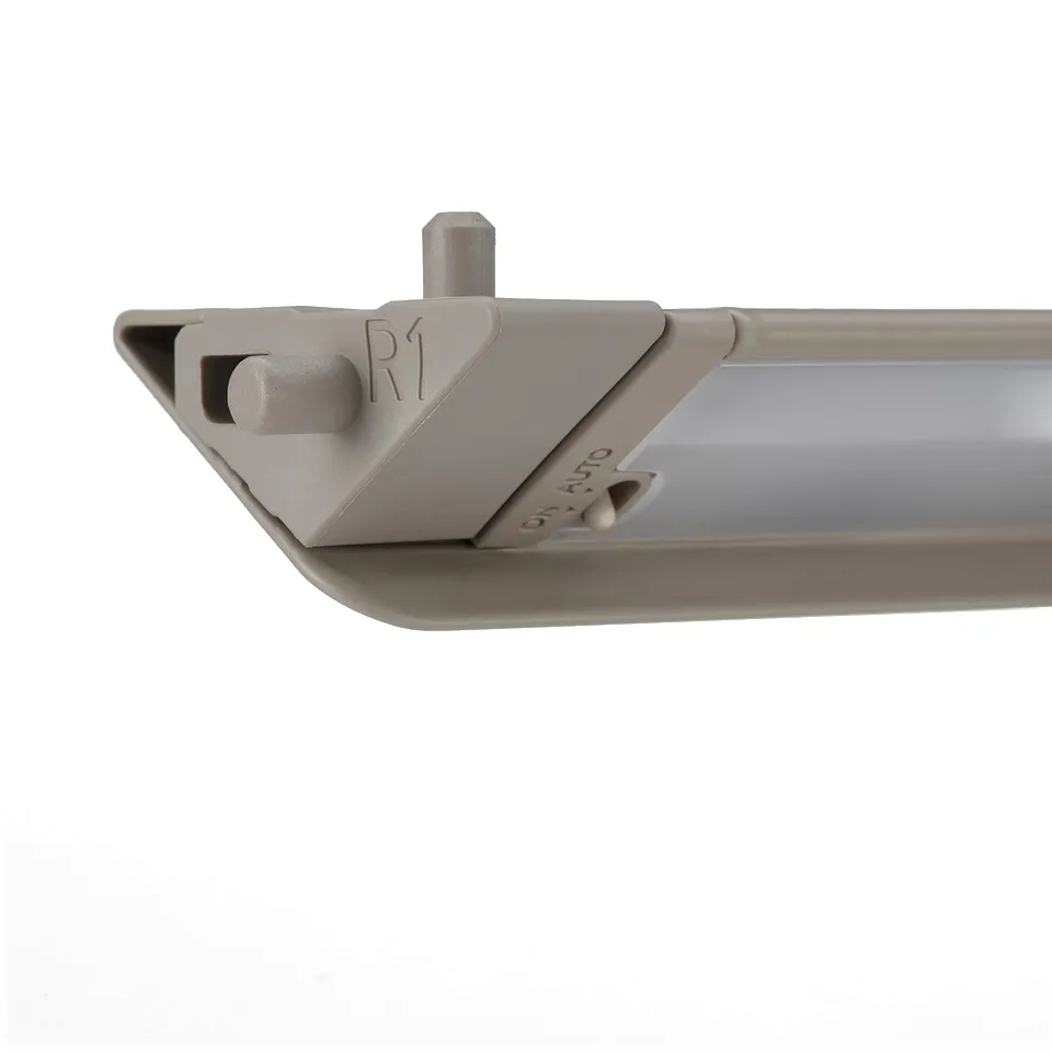 Close-up of modern led wardrobe light, showing sleek design with embedded sensor, highlighting quality materials and precise engineering.