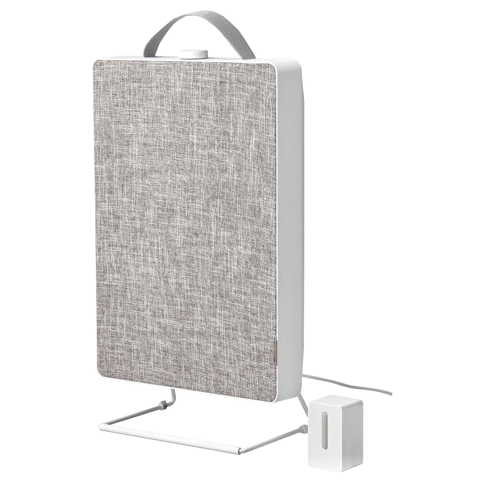 White FÖRNUFTIG air purifier with fabric front, stand, handle, and power cord.