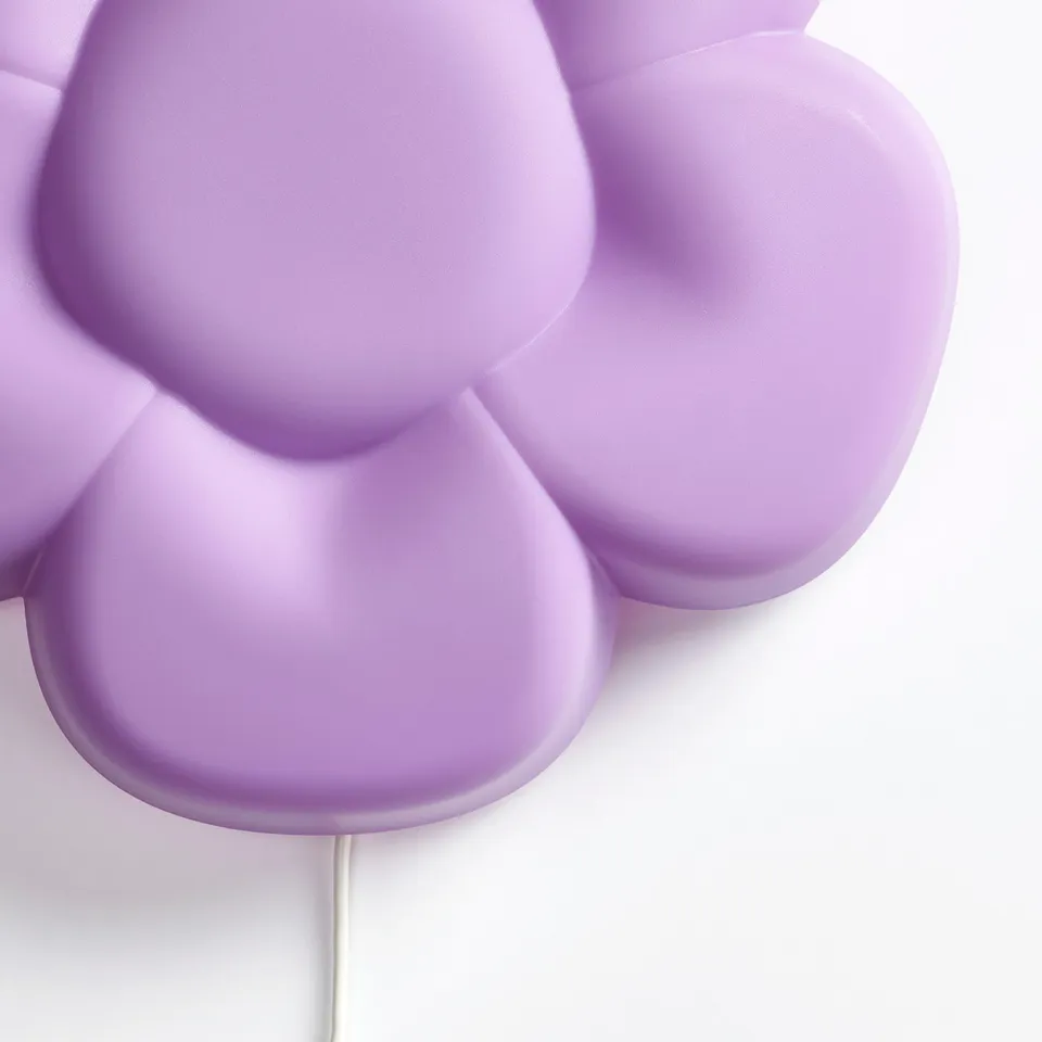 Lavender wall lamp with playful design, soft light, safe for kids.