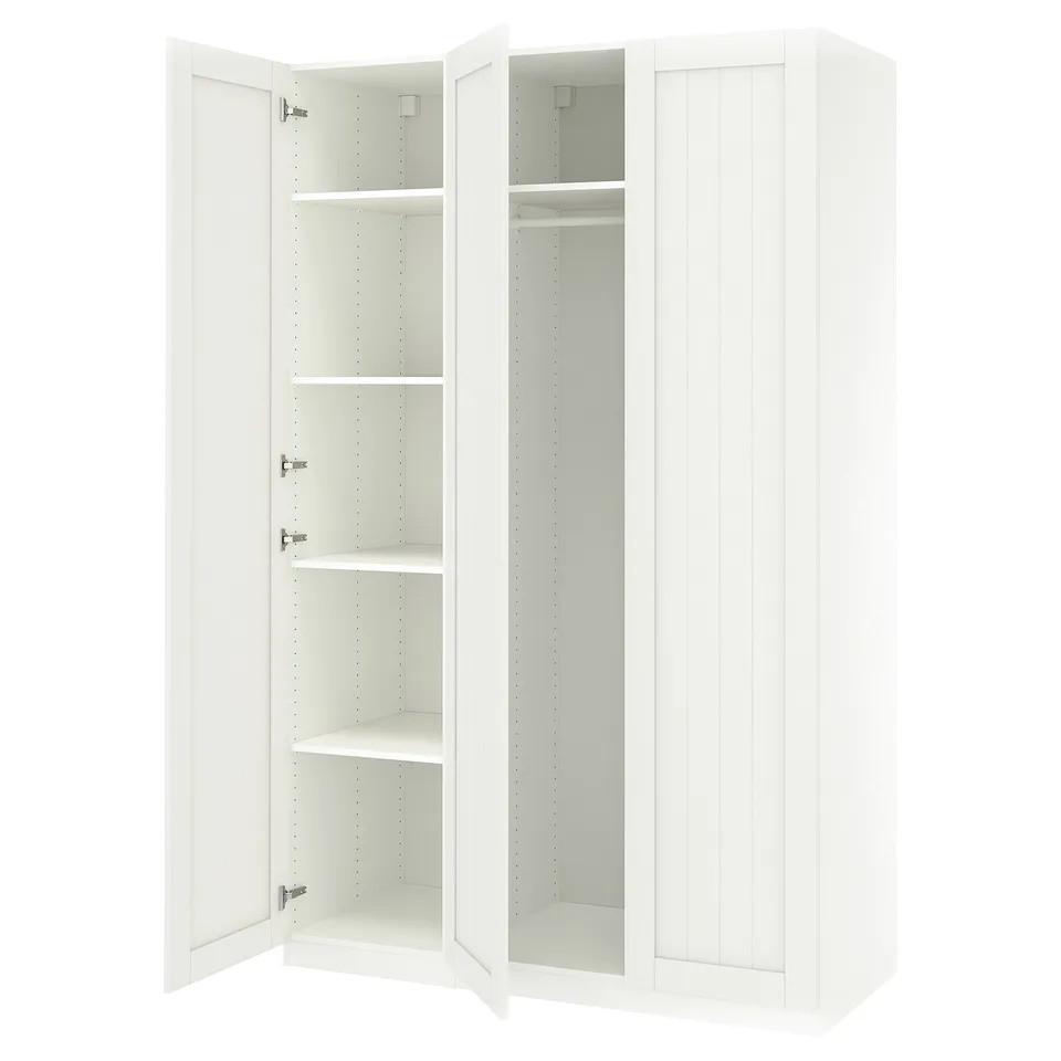 Ikea PAX white wardrobe, open doors, multiple shelves.