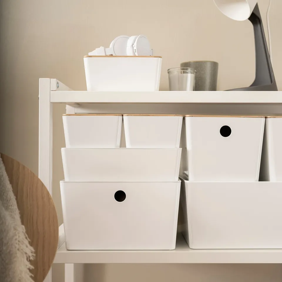 KUGGIS white box, part of a storage solution, fits perfectly in shelves, ideal for organising small items, made of recycled plastic.