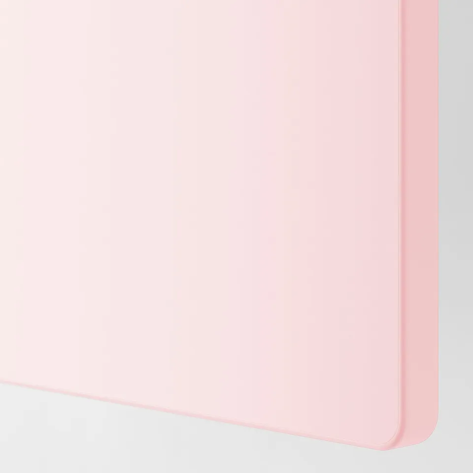 Light pink kids wardrobe with smooth, soft-close doors, designed for easy access.