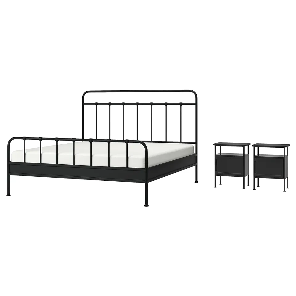 Black STJÄRNÖ bed, grey bedside table. Curved metal bed with high headboard and mixed storage.