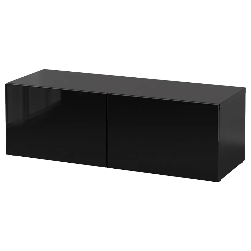 A black rectangular BESTÅ storage unit. It has a sleek, minimalist design with no visible handles.