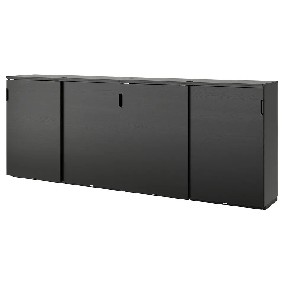 A black GALANT office storage unit with sliding doors, made from particleboard and veneer, featuring a sleek rectangular design.