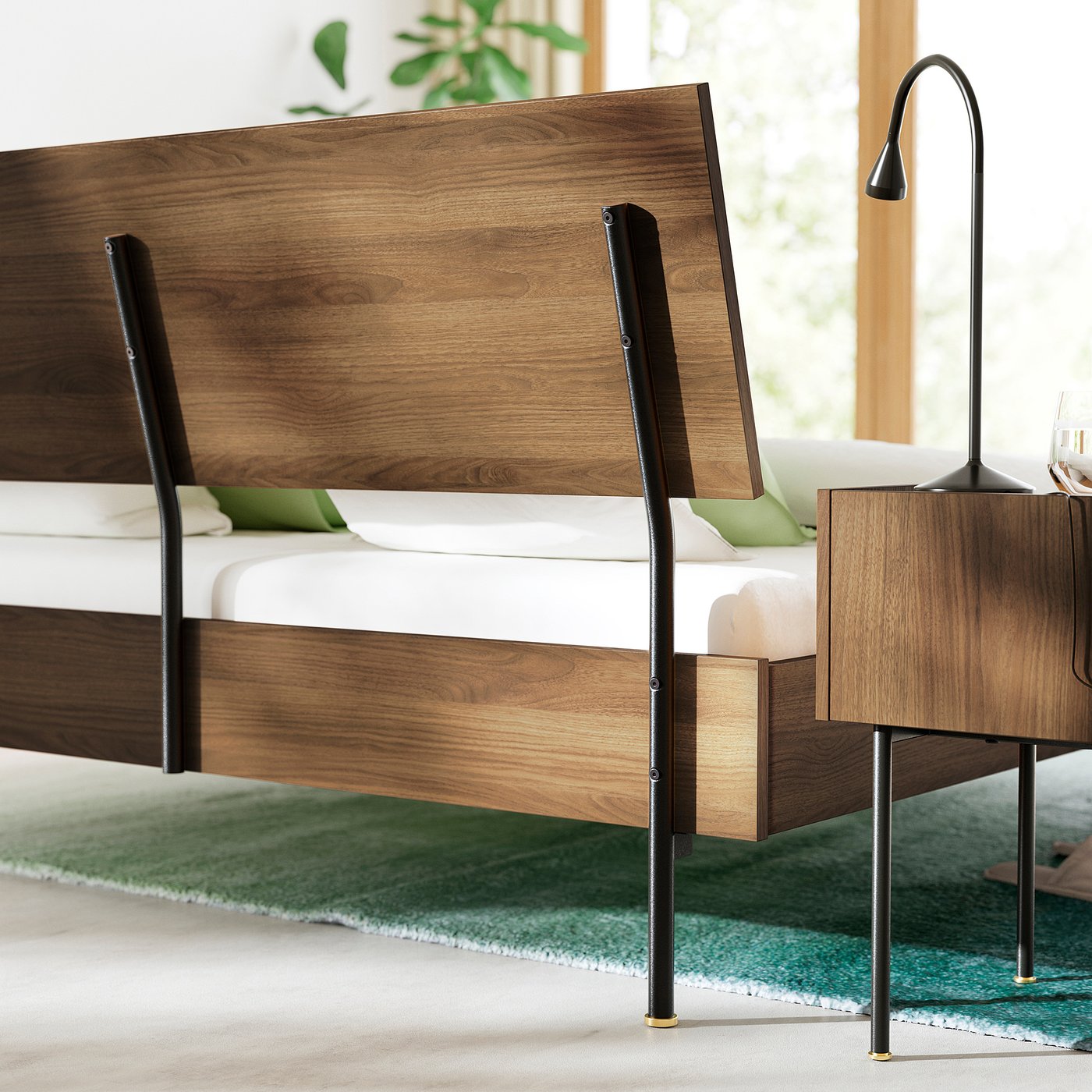 Mid-century style bed with adjustable headboard, green accents, and bedside table with drawer.