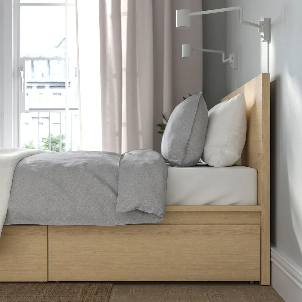 Modern wooden bed frame with adjustable sides, high headboard, and rolling storage drawers. Fits various mattress thicknesses.