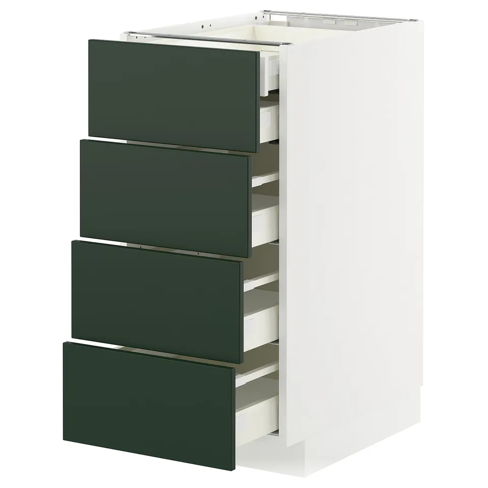Modern white METOD cabinet with four green drawers, sleek handles, and clean design.