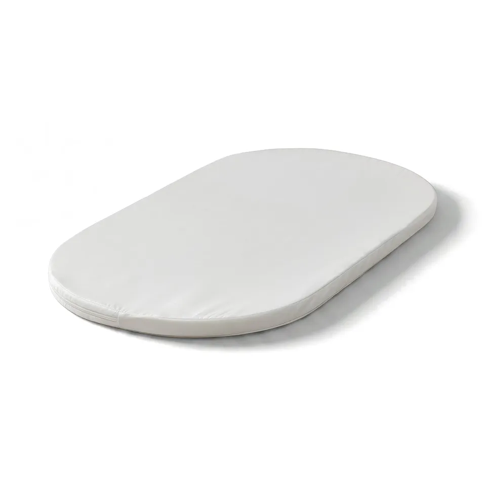 ÄLSKVÄRD white mattress, oval shape, soft fabric cover.