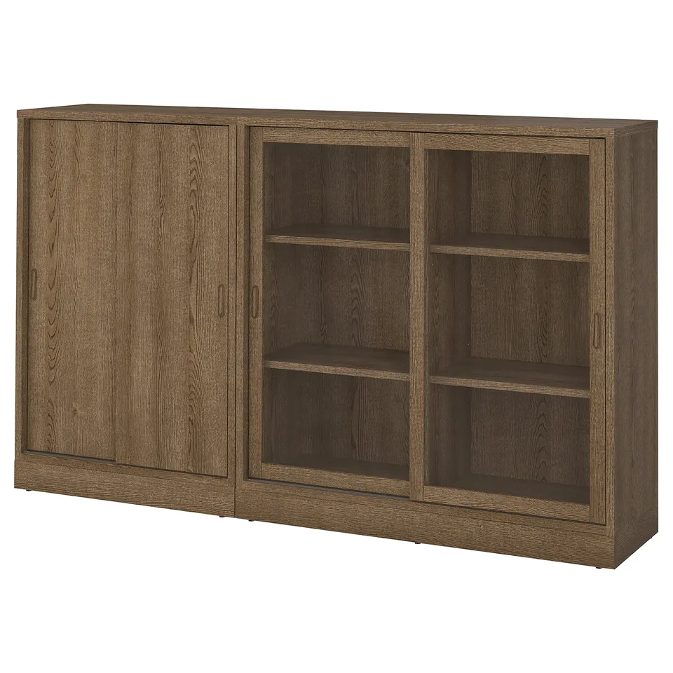 A TONSTAD storage unit in oak finish, featuring both solid and glass doors for versatile storage.