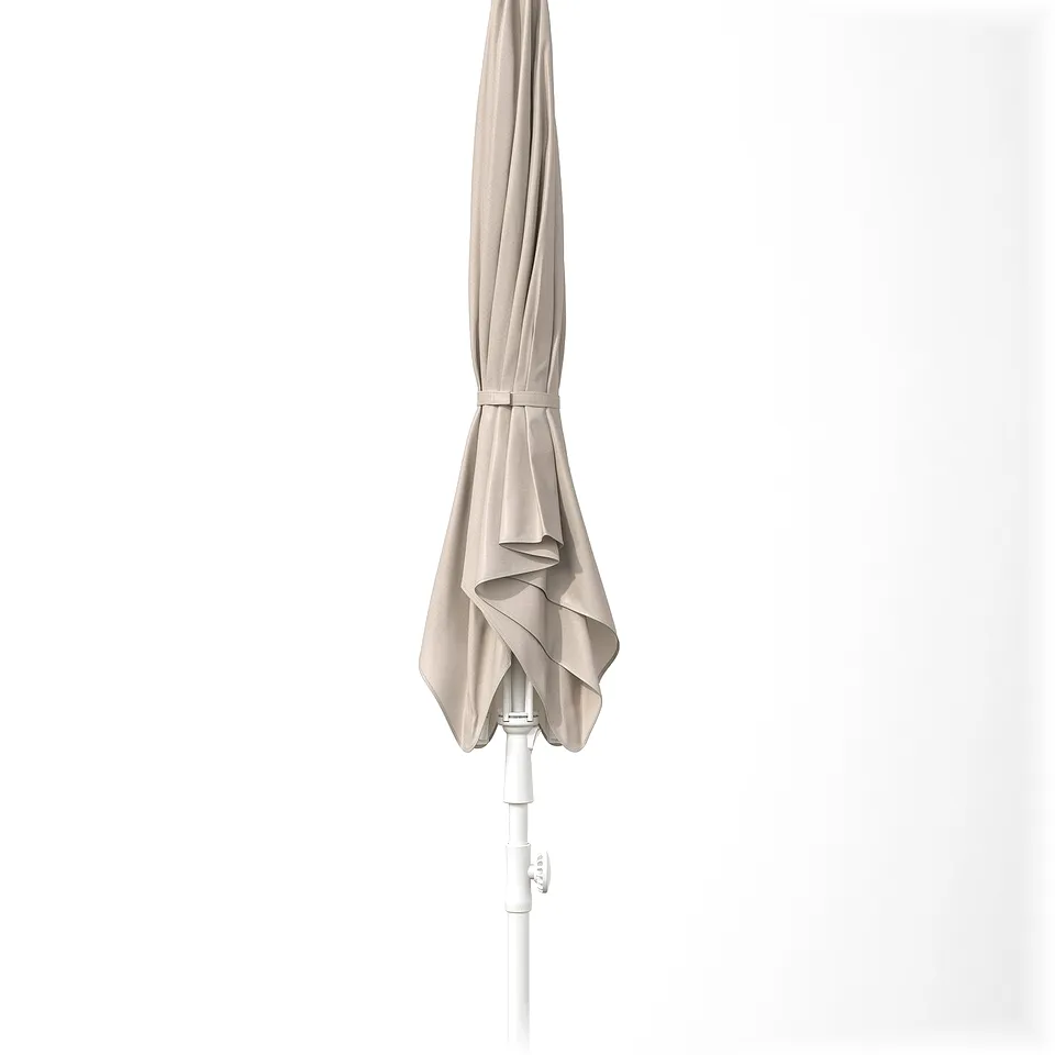 A closed, beige-colored TVETÖ parasol with a handle and strap, ready for adjustments and easy to wash.