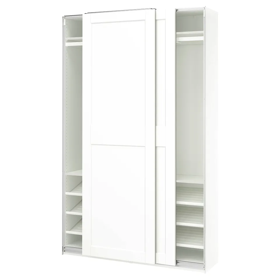 A white PAX wardrobe with sliding doors and adjustable shelves.