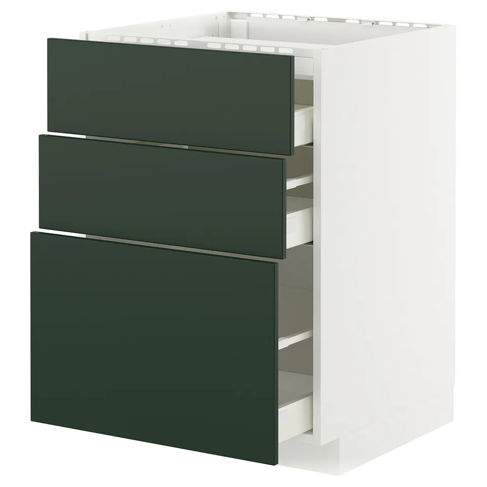 A modern kitchen cabinet with three green drawers.