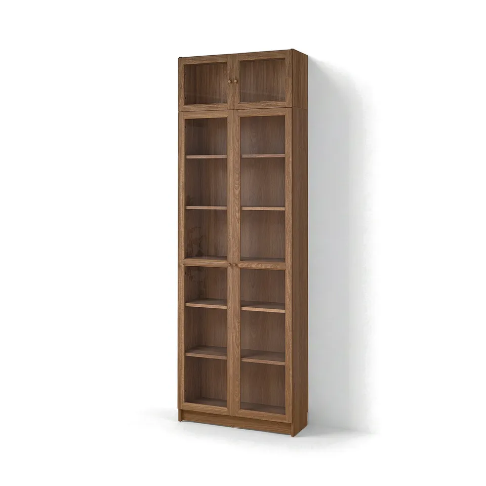 A tall, brown BILLY bookcase with glass doors, featuring multiple wooden shelves inside.