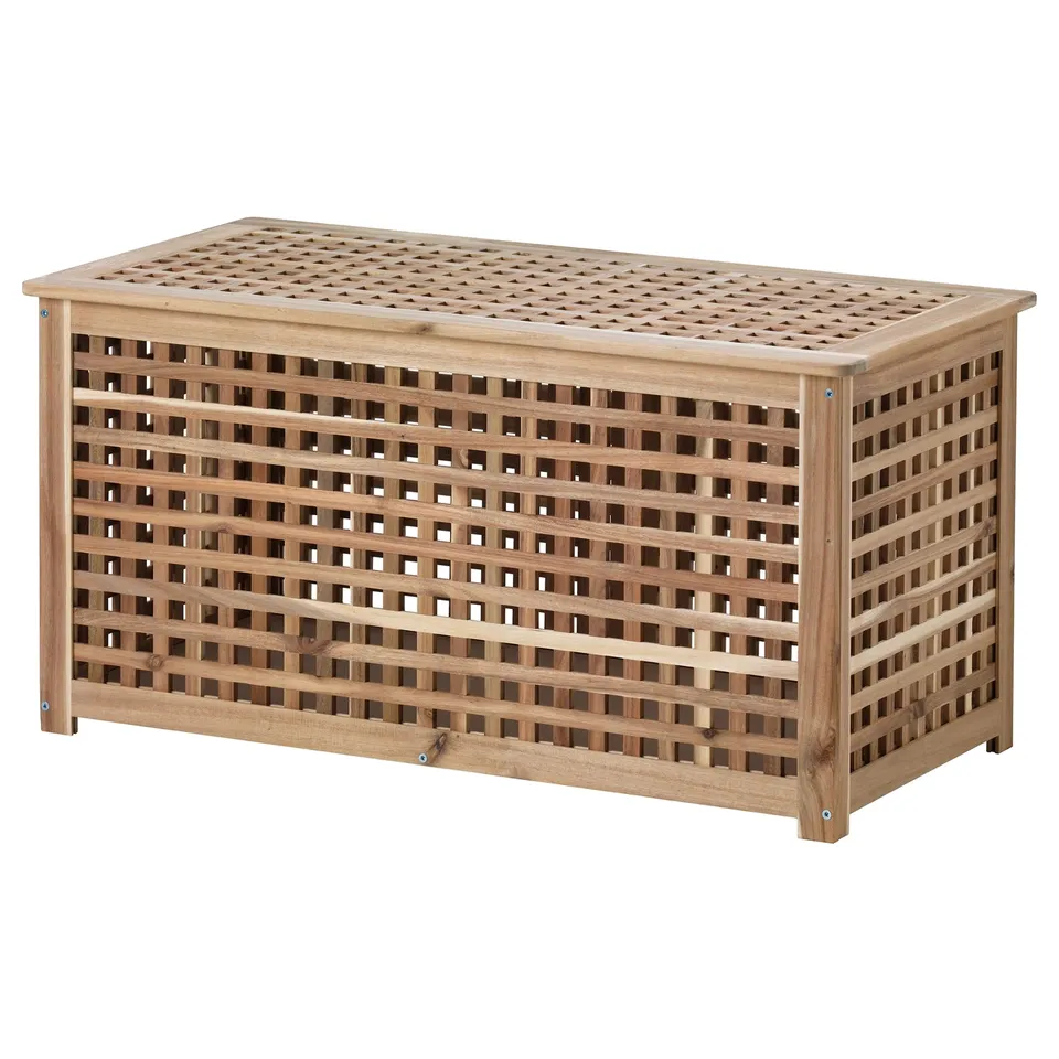 An HOL wooden lattice storage chest, light brown, rectangular with a lid, made of solid acacia wood.
