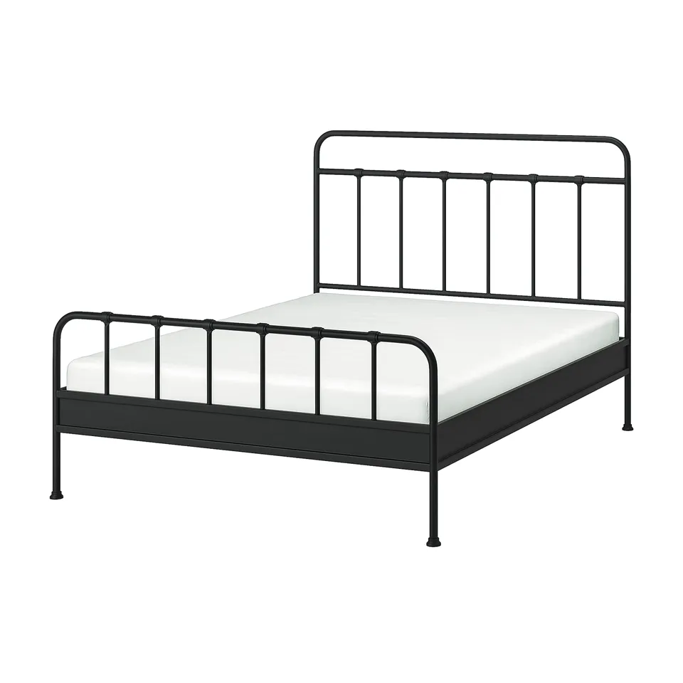 A black STJÄRNÖ metal bed with a white mattress, featuring a curved headboard and footboard.