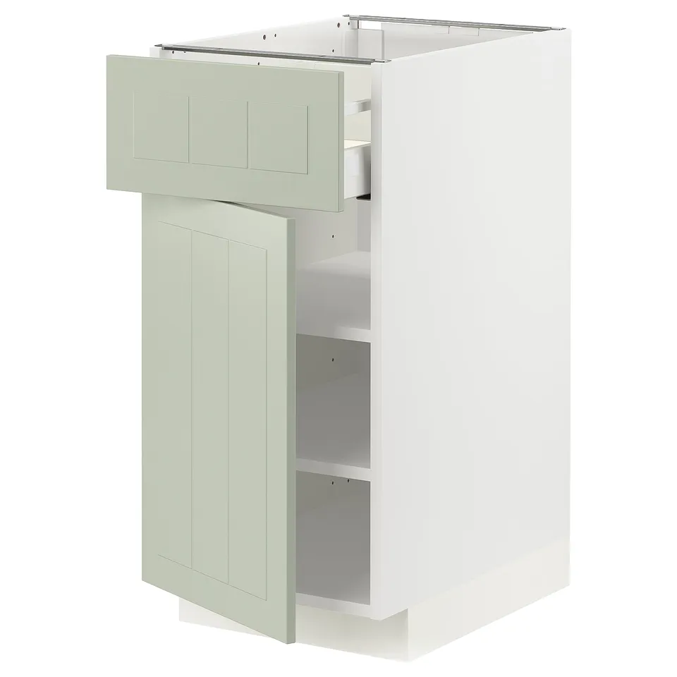 METOD kitchen unit with green stensund doors, white frame, adjustable shelves, and smooth drawer.