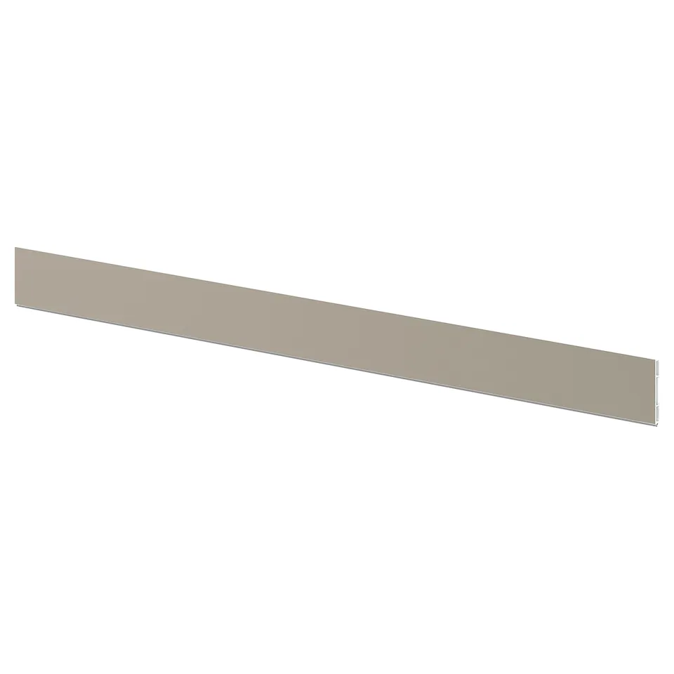 A beige kitchen plinth, rectangular and flat, made of recycled plastic.