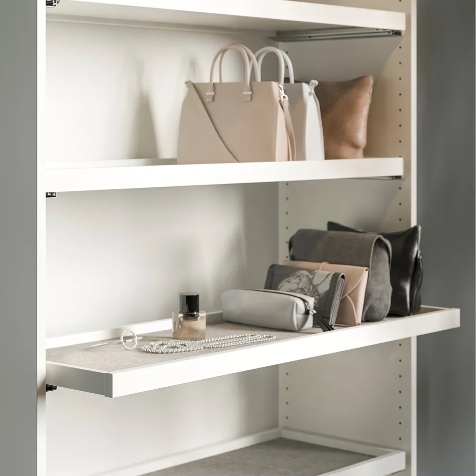Closet shelf with handbags and jewellery. Or for a more concise version: closet shelf with bags and jewellery.