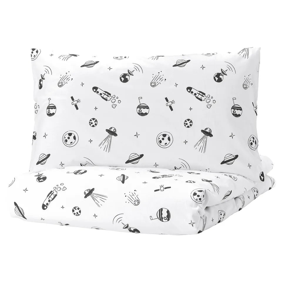 AFTONSPARV duvet cover, white with black space-themed designs, rectangular shape.