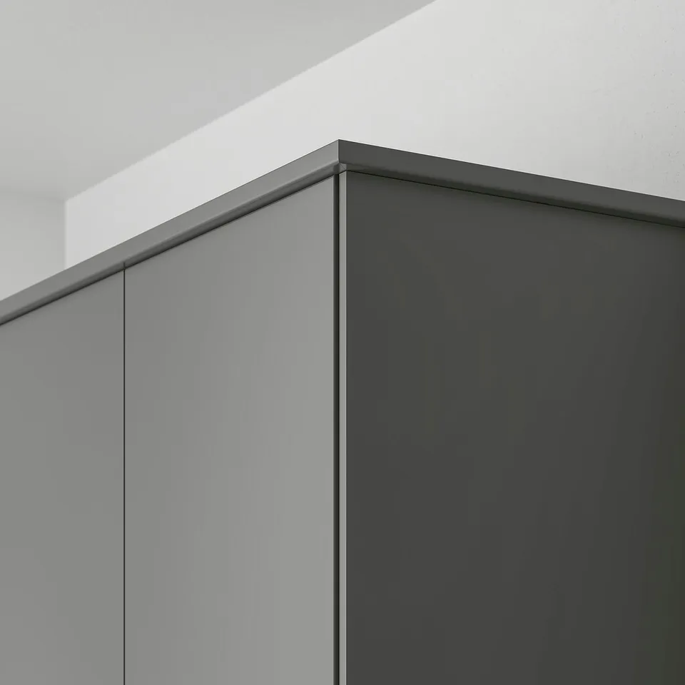 Modern grey cabinet trim, hiding lighting cords.
