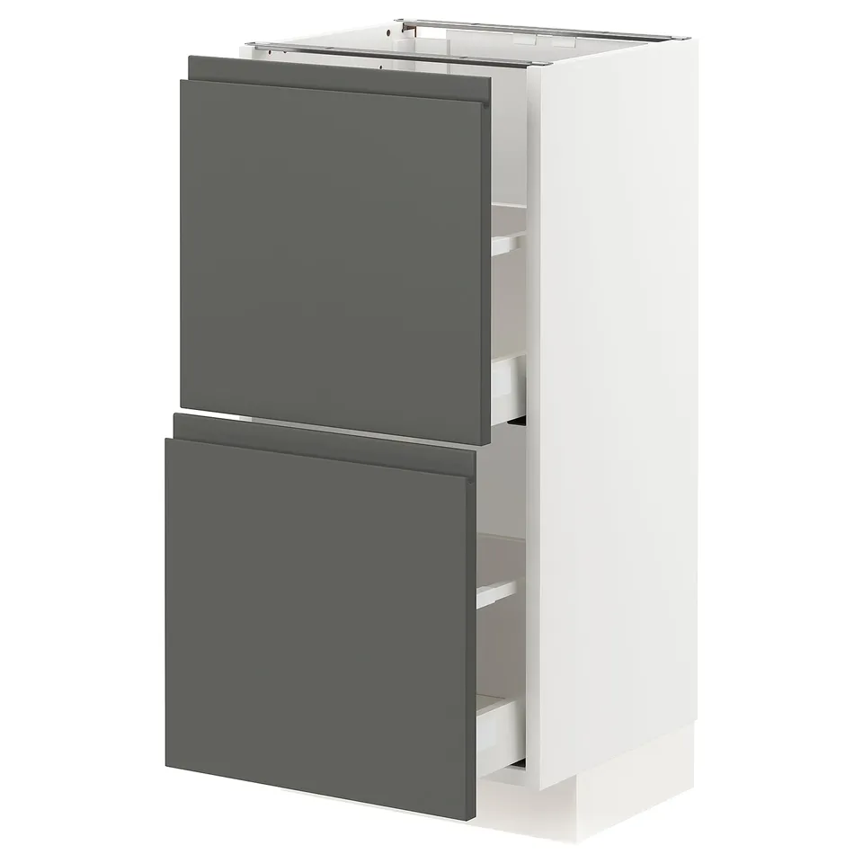 Modern, sleek kitchen cabinet, white and dark grey, with integrated handles, smooth push-to-open drawers.