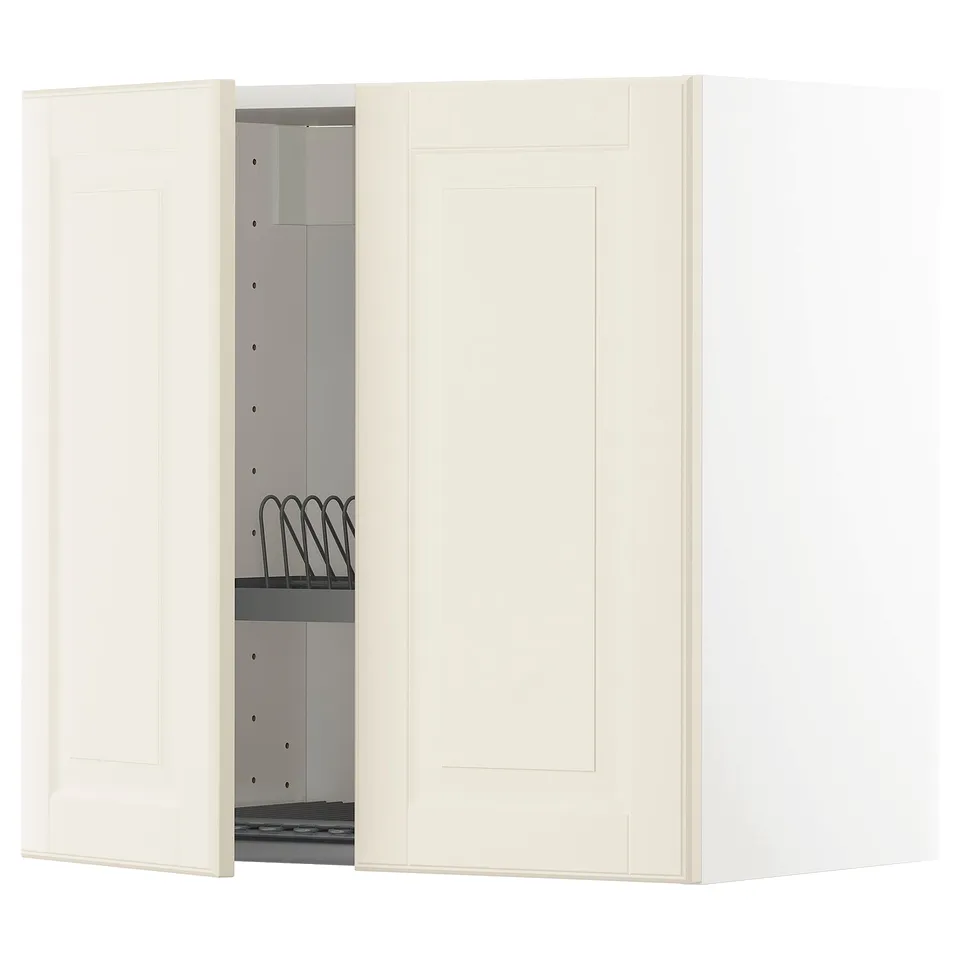 A white, wall-mounted ikea METOD kitchen cabinet with one door open, revealing an adjustable shelf and a black wire dish drainer.