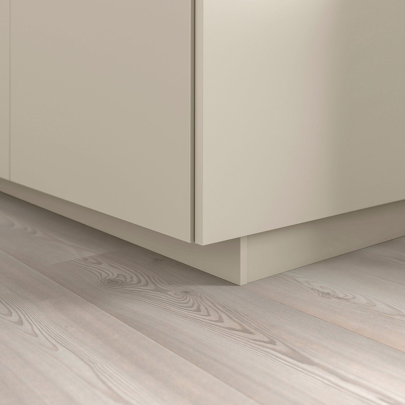 Beige HAVSTORP kitchen plinth covers floor gap, part of metod series.