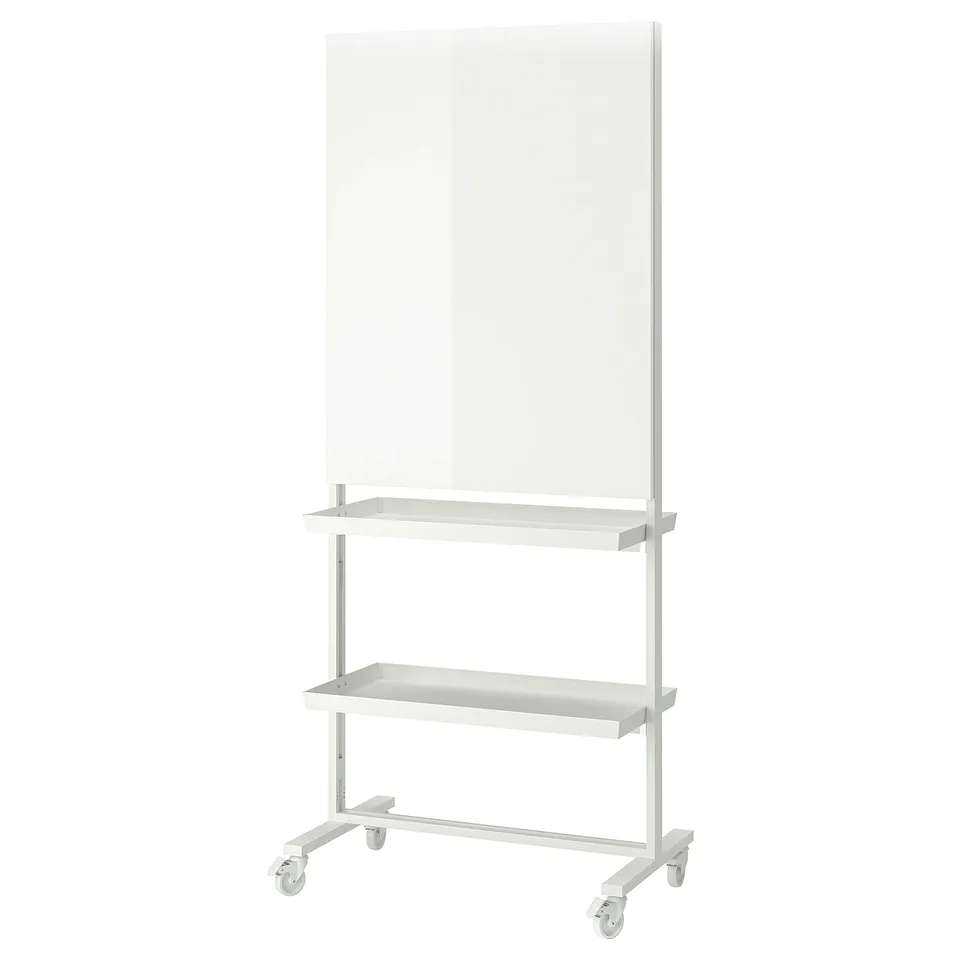 A white MITTZON mobile divider with a clear board and shelves. Its versatile for offices and includes wheels for easy movement.