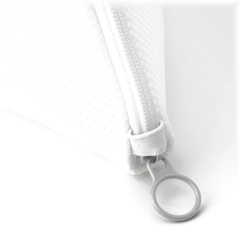 Close-up of white mesh washing bags sturdy zip with silver pull ring, showcasing durable quality.