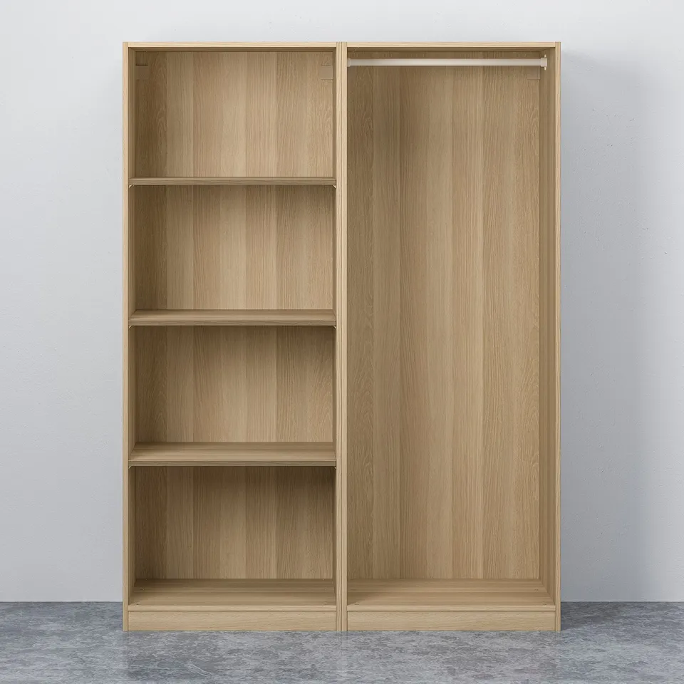 Light wood wardrobe with four empty shelves on left, sliding doors on right.