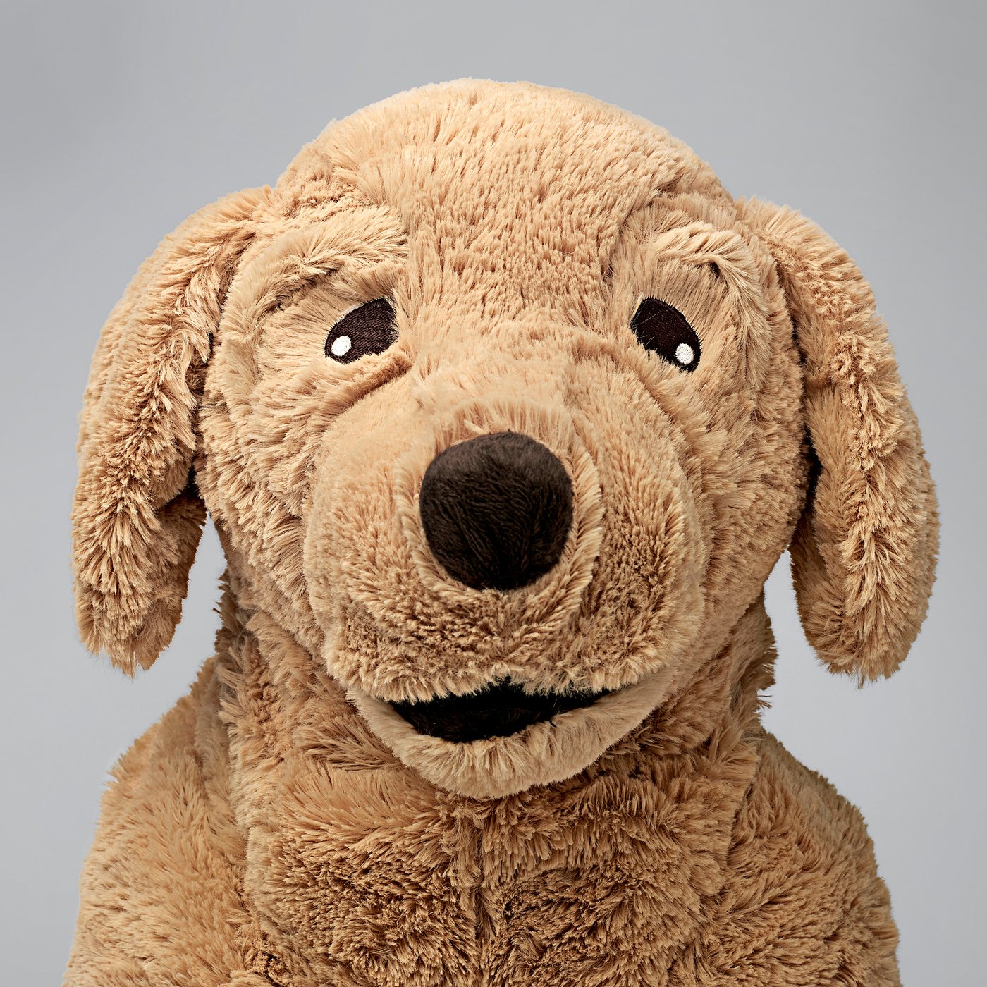 Soft, plush dog toy with realistic perfect for cuddling, hugging, and play. High-quality, durable material.