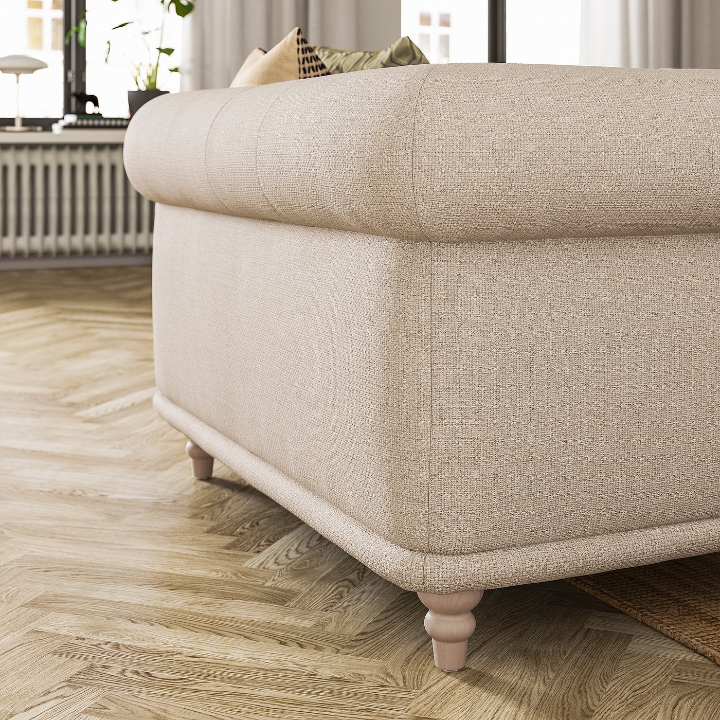 Beige VISKAFORS sofa, classic design, soft rounded shapes, wooden legs.