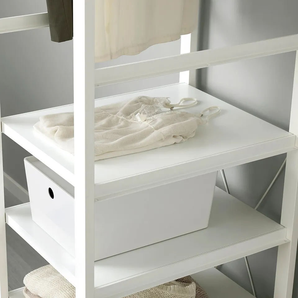 ELVARLI storage shelf with fabric bag, white storage box, and woven basket. Adjustable, customizable storage.
