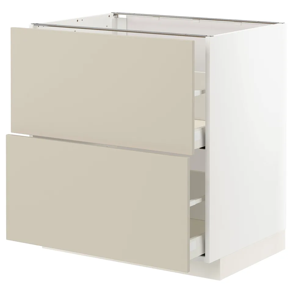Modern kitchen cabinet in beige, featuring two drawers and a smooth, clean design.