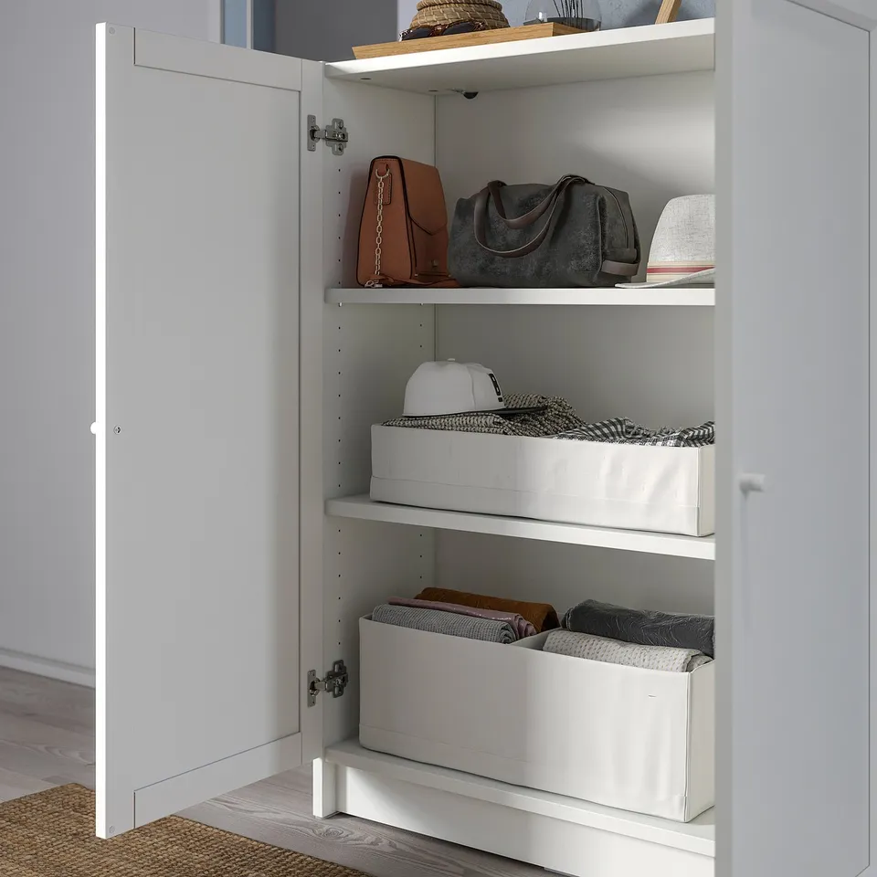 Open BILLY bookcase with 3 shelves: handbags, hat & textiles, folded clothes.