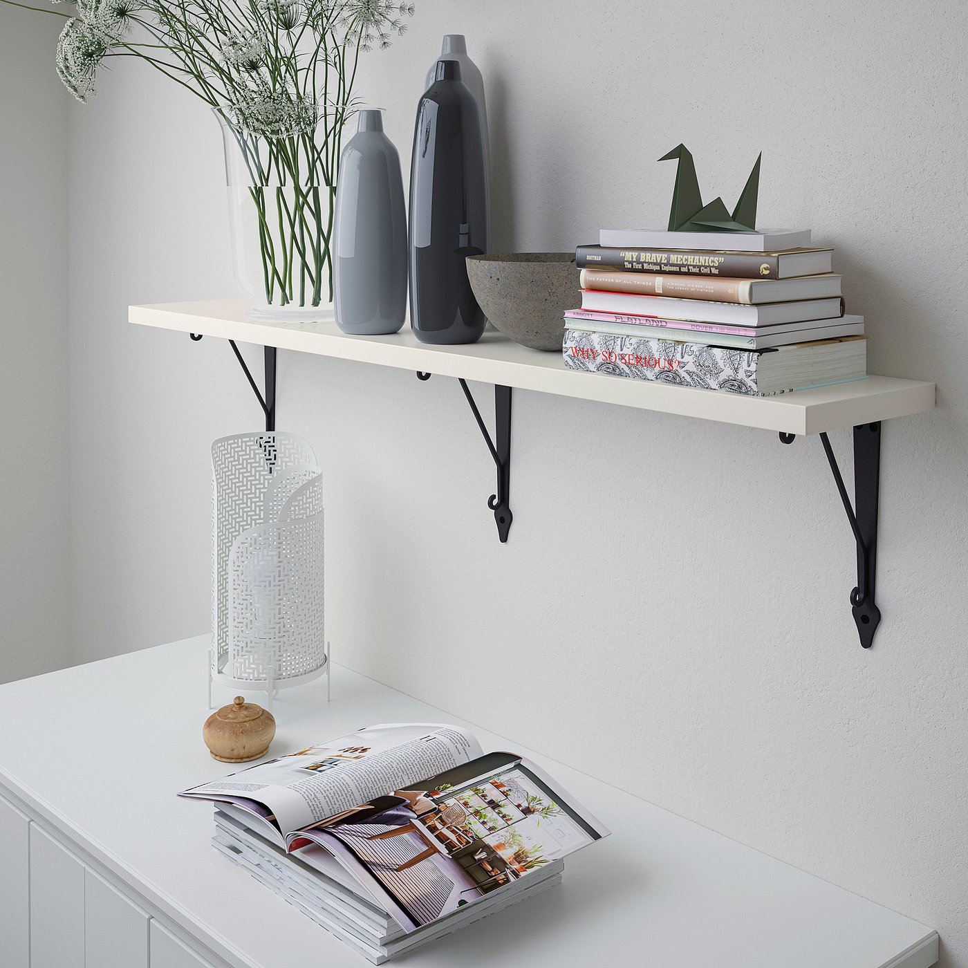 Realistic a white wall shelf with two vases, a stack of books, and a cylinder light.