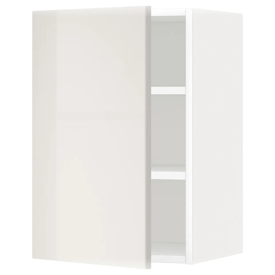 A white, glossy kitchen cabinet from the METOD system, showcasing a sleek design with an adjustable shelf and a reversible door.