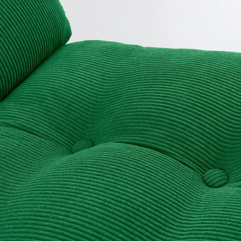 Bright green, textured fabric on a curved, supportive chair. Noticeable stitching detail.