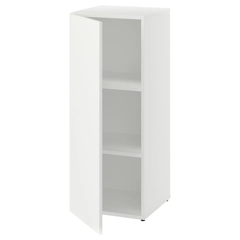A white LASTARE shelving unit with adjustable feet. It has three open shelves and a minimalist design.