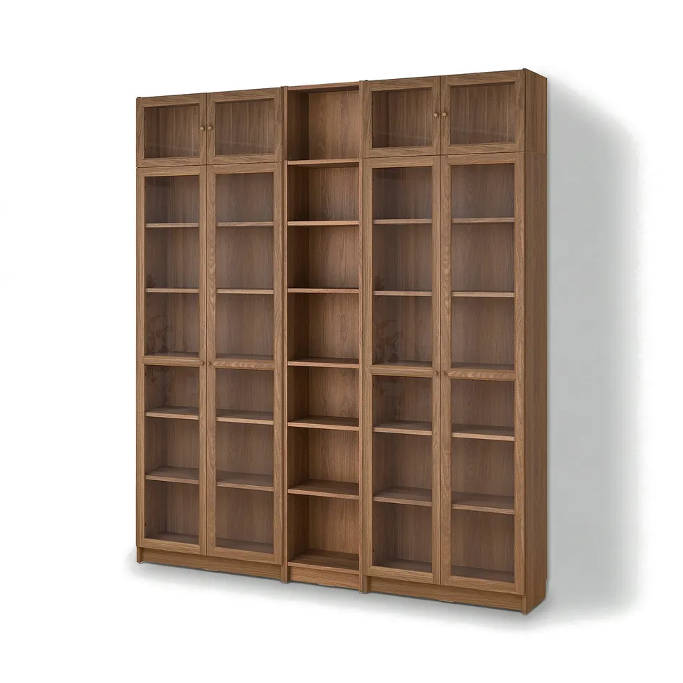 A BILLY bookcase in brown wood with empty shelves.