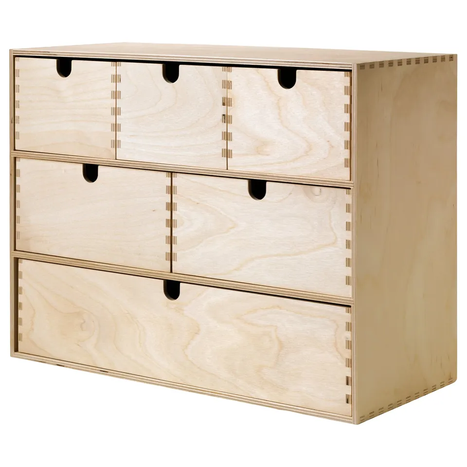 A light wooden MOPPE chest with six small drawers. It has a classic, simple design.