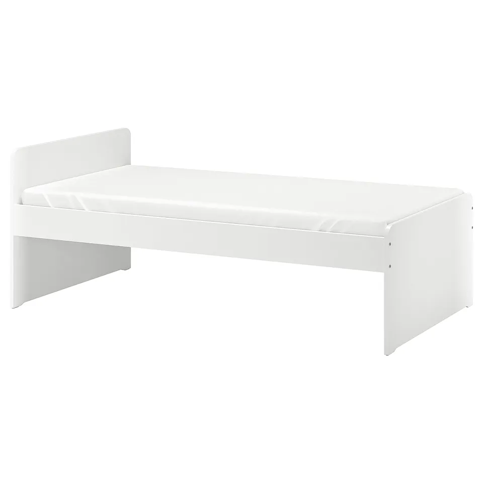 A white SLÄKT bed frame, modern, rectangular with rounded corners, made of particleboard and acrylic paint.