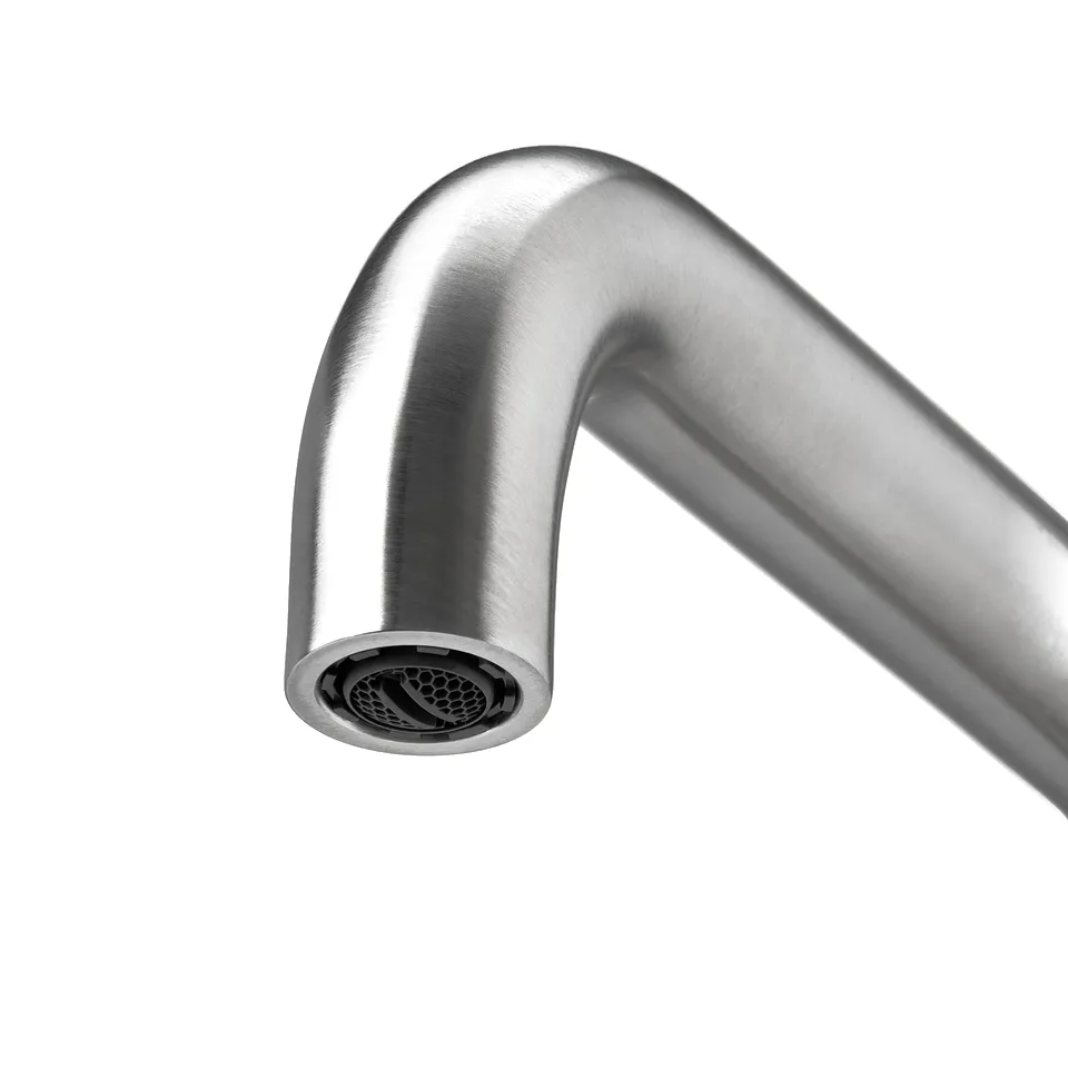 Stainless steel kitchen tap with sleek, curved spout; smooth water flow, robust design.
