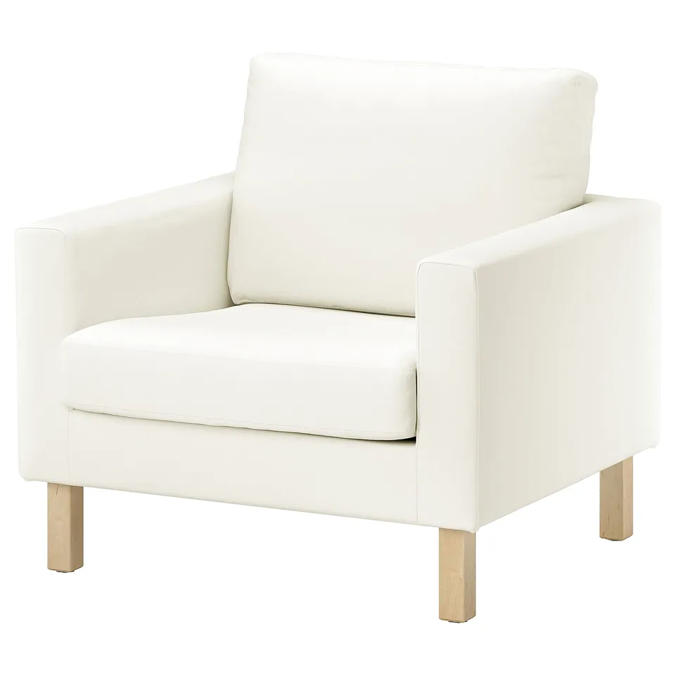 A modern white armchair named SALTSJÖBADEN with sleek wooden legs.