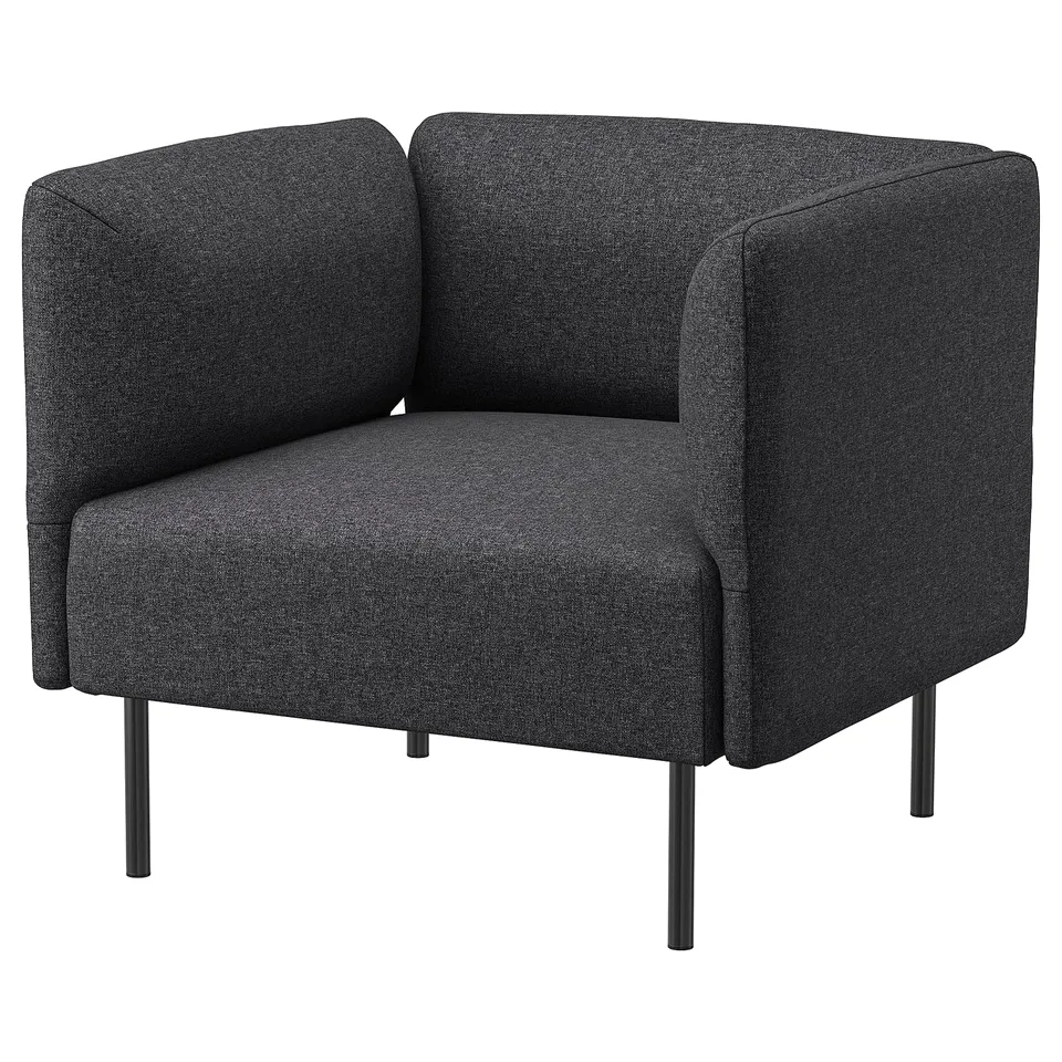 A modern, dark grey, cube-shaped armchair with a removable cover, metal legs, and three-sided backrest for comfort.